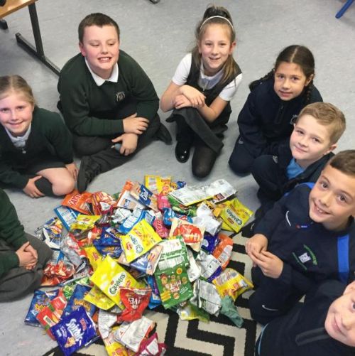 Sorting out crisp packets for recycling!